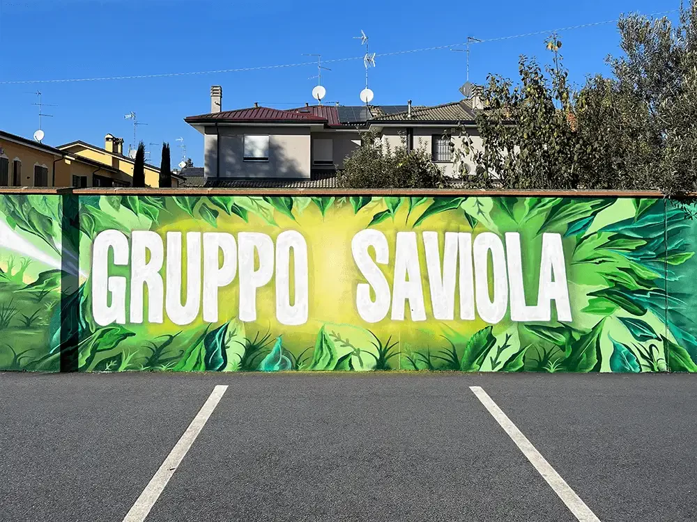Murale partecipativo Saviola Art Factory su superficie di 150 metri.webp